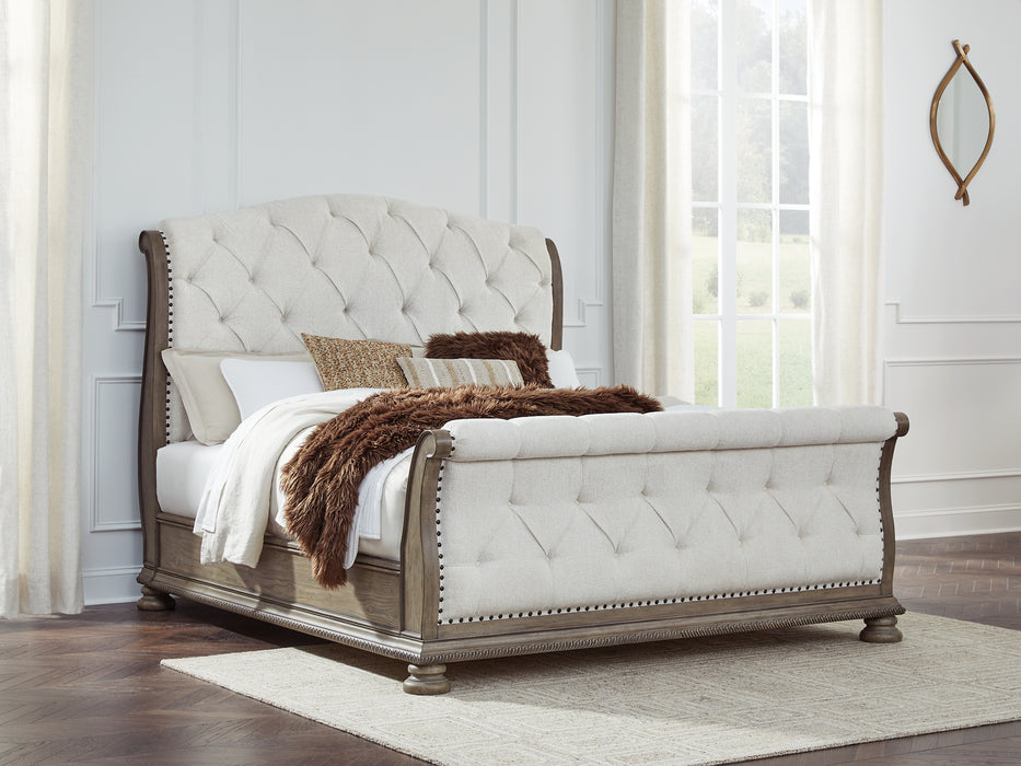 Ardenfield King Upholstered Sleigh Bed with Mirrored Dresser and Chest
