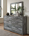 Baystorm Queen Panel Headboard with Mirrored Dresser and Chest Huntsville Furniture Outlet