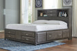 Caitbrook Queen Storage Bed with 8 Drawers with Dresser and Chest Huntsville Furniture Outlet