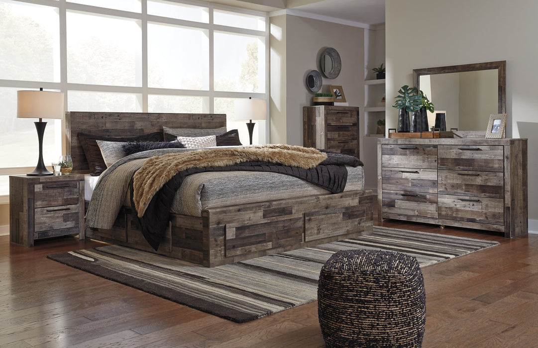 Derekson King Panel Bed with 4 Storage Drawers with Mirrored Dresser, Chest and Nightstand Huntsville Furniture Outlet
