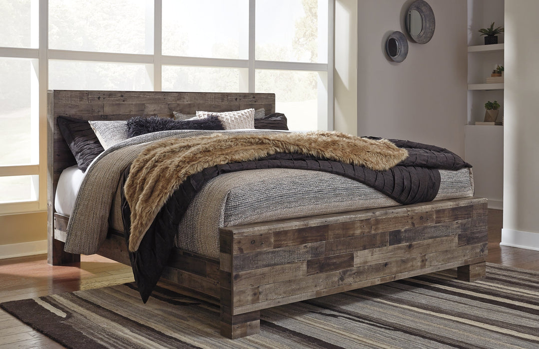 Derekson King Panel Bed with Mirrored Dresser and Chest Huntsville Furniture Outlet