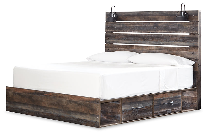 Drystan King Panel Bed with 4 Storage Drawers with Mirrored Dresser, Chest and Nightstand Huntsville Furniture Outlet