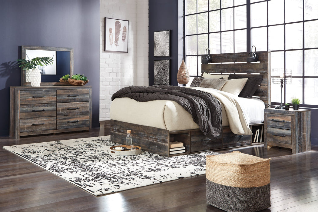 Drystan King Panel Bed with 4 Storage Drawers with Mirrored Dresser, Chest and Nightstand Huntsville Furniture Outlet