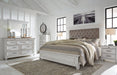 Kanwyn Queen Panel Bed with Mirrored Dresser and 2 Nightstands Huntsville Furniture Outlet