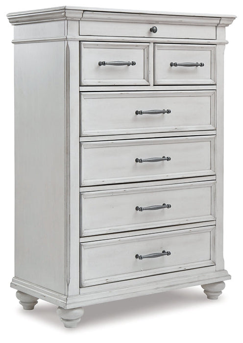 Kanwyn Queen Panel Bed with Mirrored Dresser and Chest Huntsville Furniture Outlet