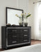 Kaydell King Upholstered Panel Bed with Mirrored Dresser Huntsville Furniture Outlet