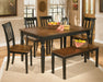 Owingsville Dining Table and 4 Chairs and Bench Huntsville Furniture Outlet